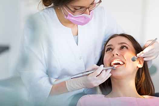 A dentist and patient in a dentist’s office