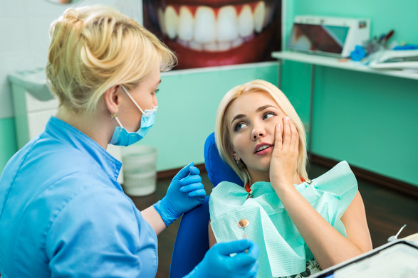 patient visiting dentist for emergency care